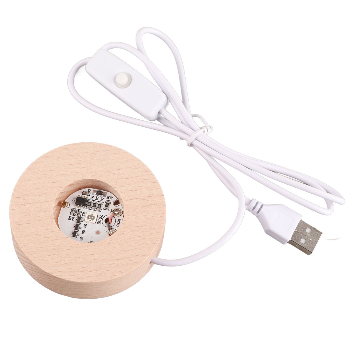 Ein Holzsockel mit kleiner Glühbirne, weißem USB-Kabel und Schalter. Der Sockel ist rund.