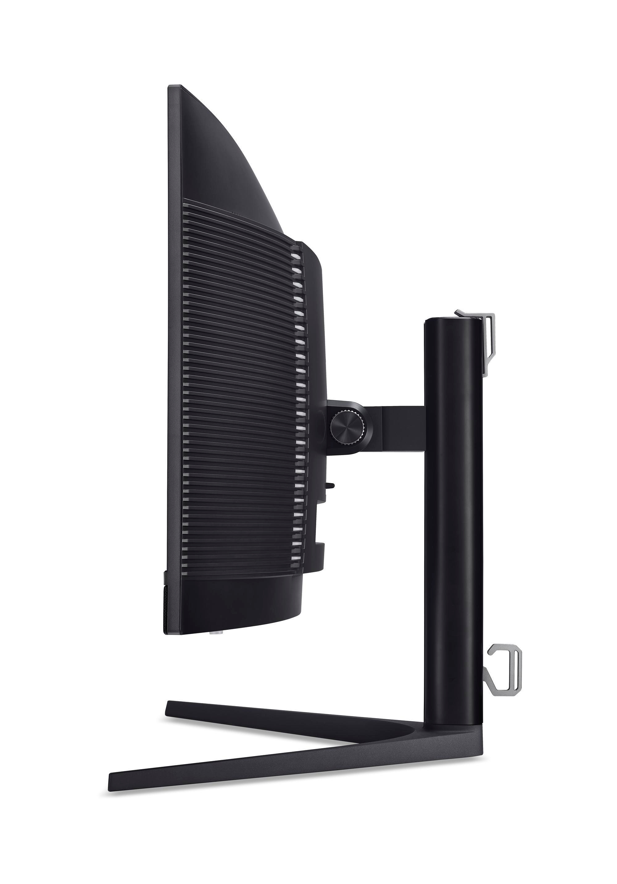 Czarny monitor komputera z boku, ze stojakiem. Wyświetlacz, tył i stojak czarne.