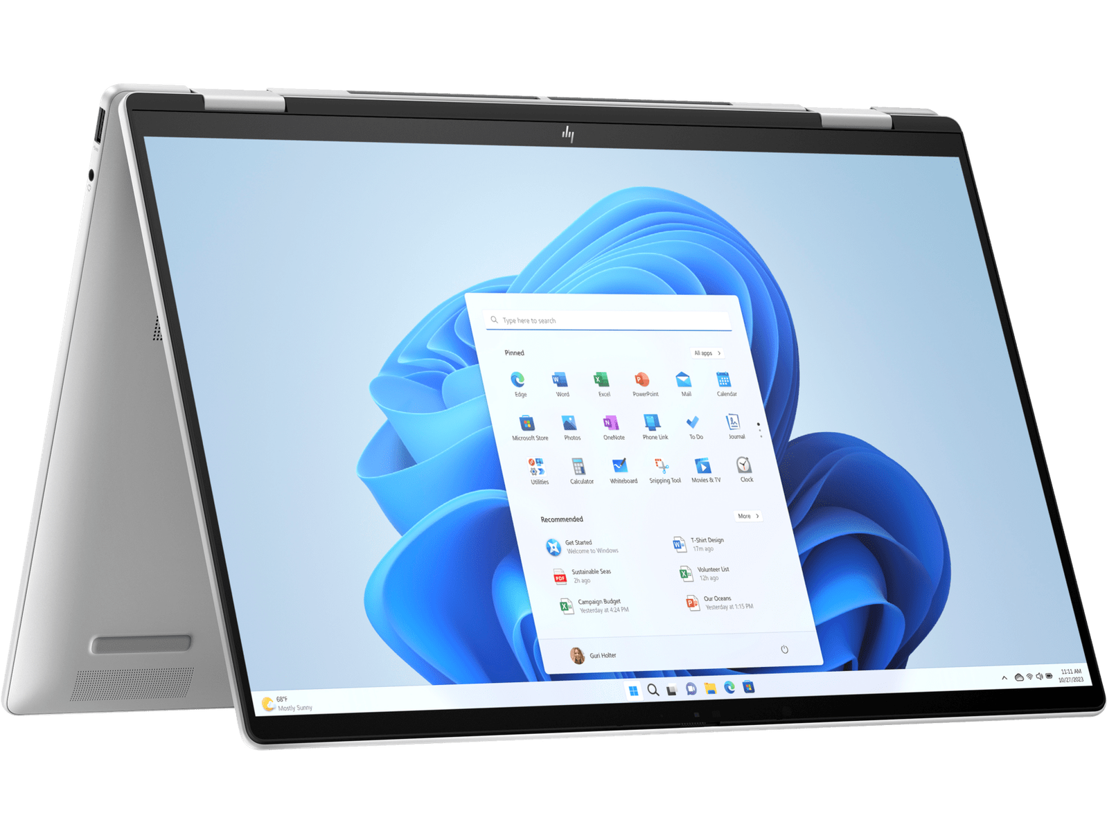 Portátil HP plateado con una pantalla de Windows 11.