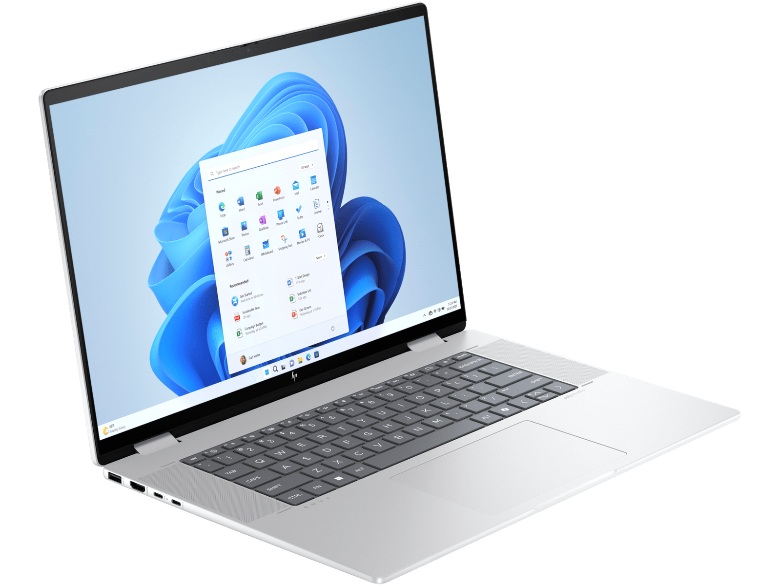 Una computadora portátil plateada con una pantalla abierta que muestra una interfaz de Windows 11.