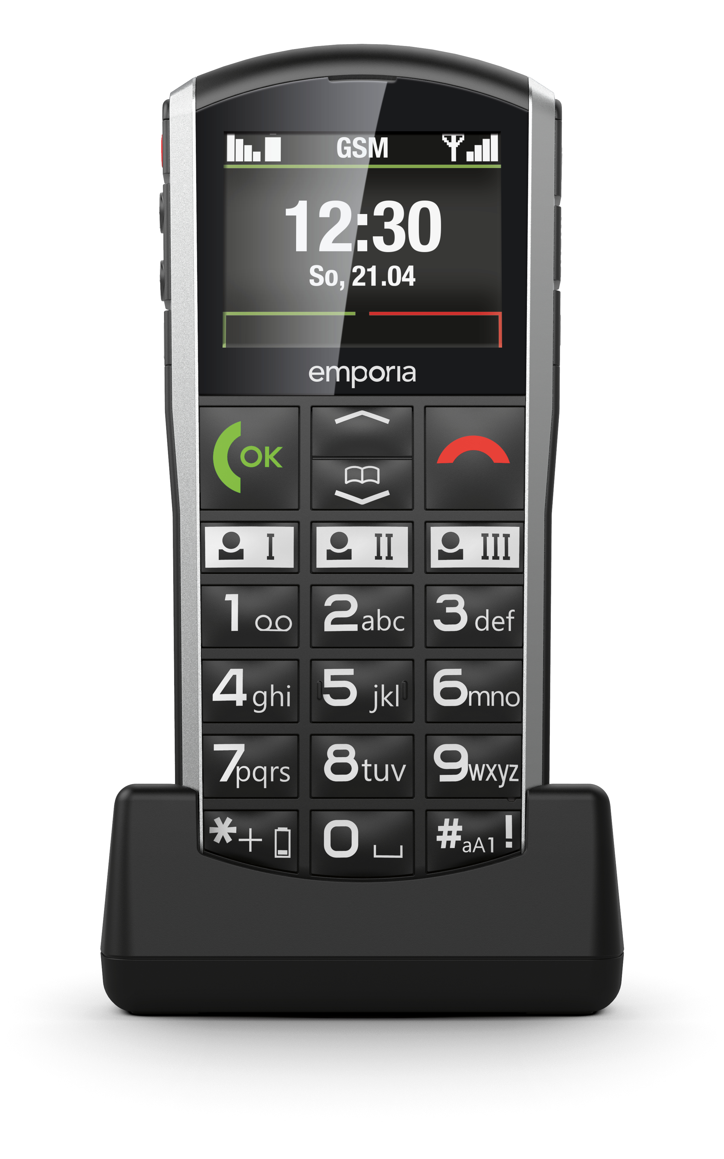 Ein silbernes und schwarzes Mobiltelefon auf einer Ladestation mit großen Tasten und Bildschirmanzeige.