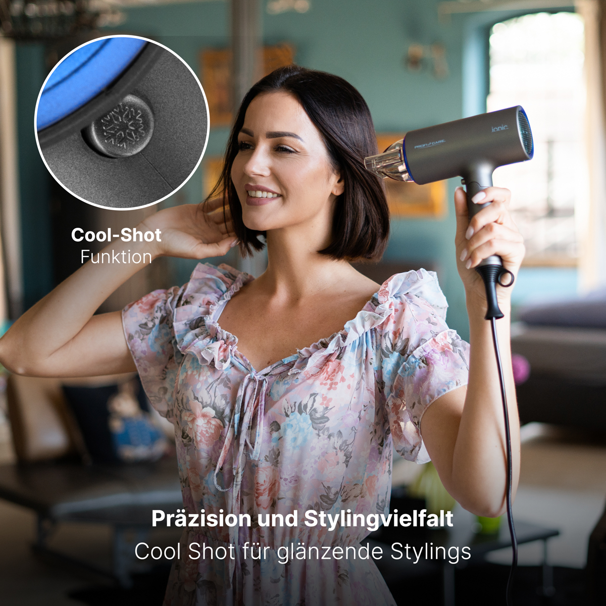 Kobieta używająca suszarki do włosów, z bliska przycisku chłodnego powietrza.