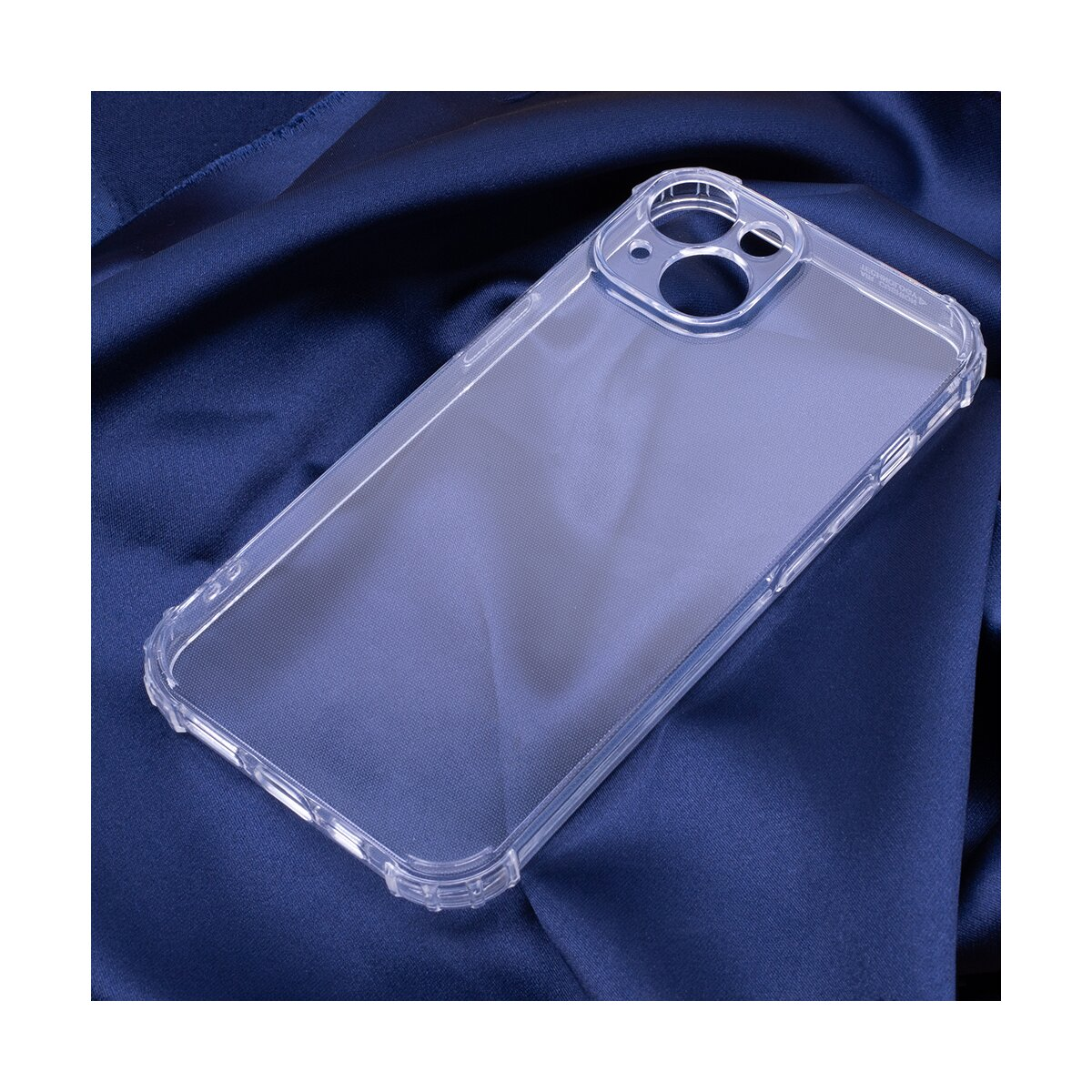 Custodia trasparente per telefono su tessuto blu scuro, che mostra i ritagli della fotocamera.