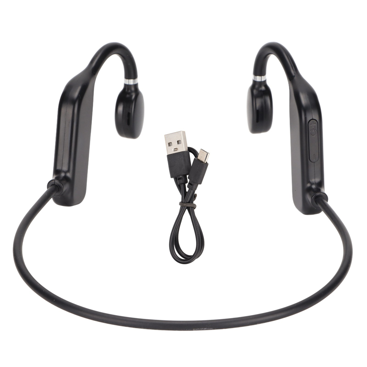 Schwarze Knochenschallkopfhörer und ein USB-Kabel vor weißem Hintergrund.