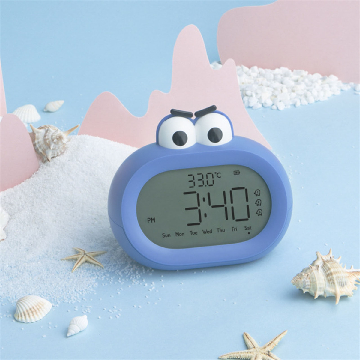 Blaue Cartoon-Uhr mit digitaler Anzeige und Seesternen.