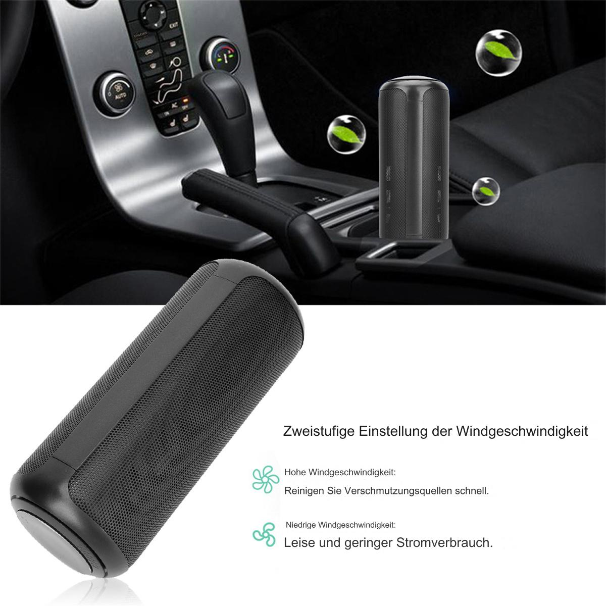 Schwarzer Auto-Lufterfrischer. Im Auto platziert. Blasen und Text sichtbar.