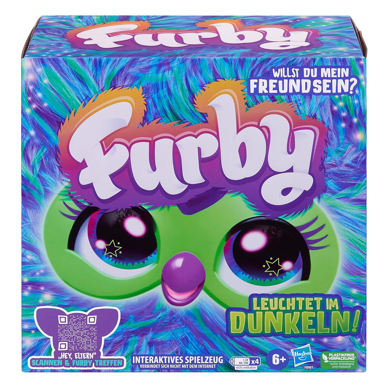 Pudełko Furby z logo Furby, oczami i frazą 'WILLST DU MEIN FREUND SEIN?'.