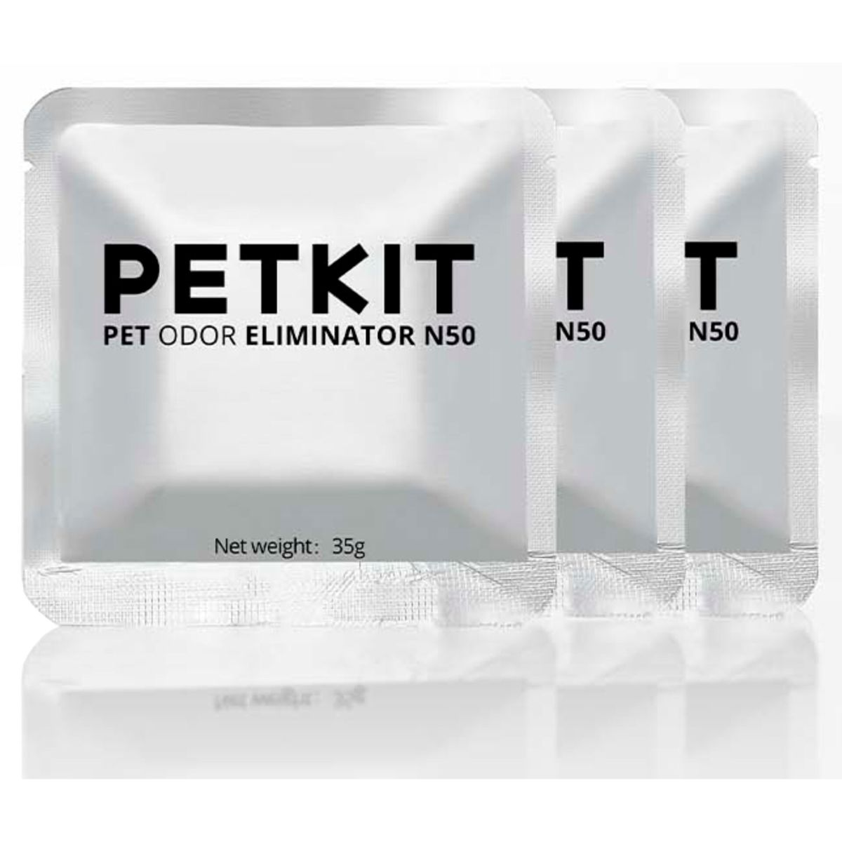 Üç beyaz PETKIT koku giderici paket, 35g net.