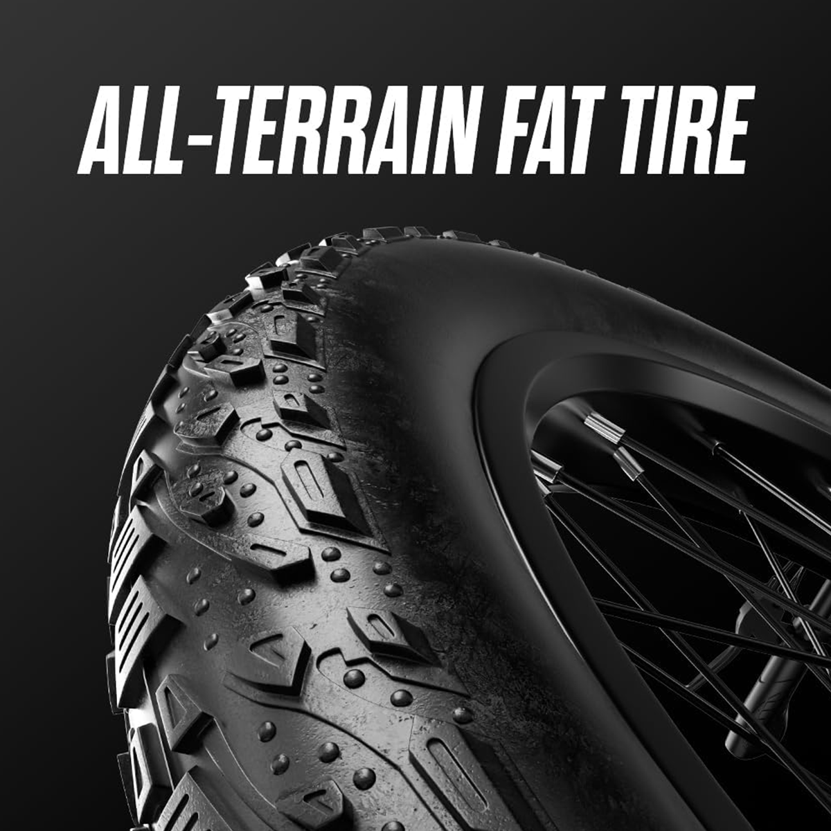 Opona typu fat all-terrain na czarnym tle. Zbliżenie bieżnika opony.