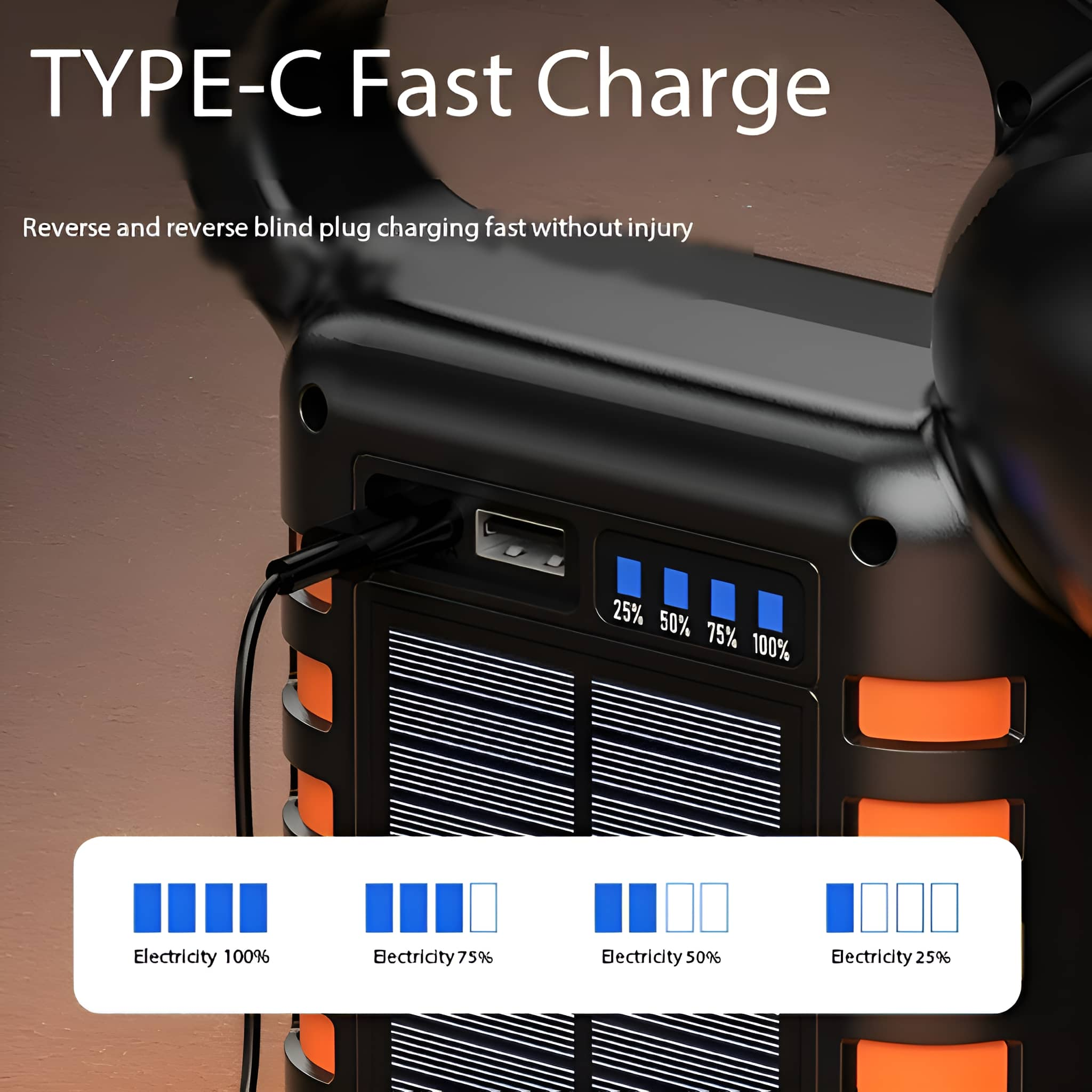 Eine schwarze und orange Powerbank mit Ladezustandsanzeige.