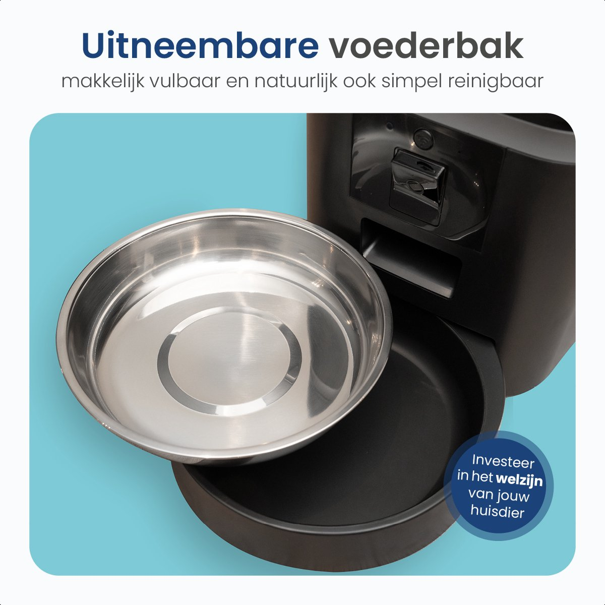 A pet feeder with a stainless steel bowl and a black base. The text says 'Uitneembare voederbak'.