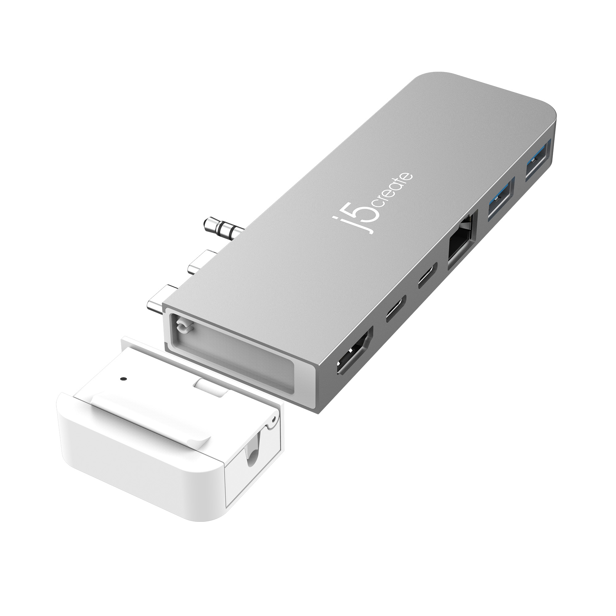 Silberner j5create Adapter mit mehreren Anschlüssen und einer weißen abnehmbaren Komponente.