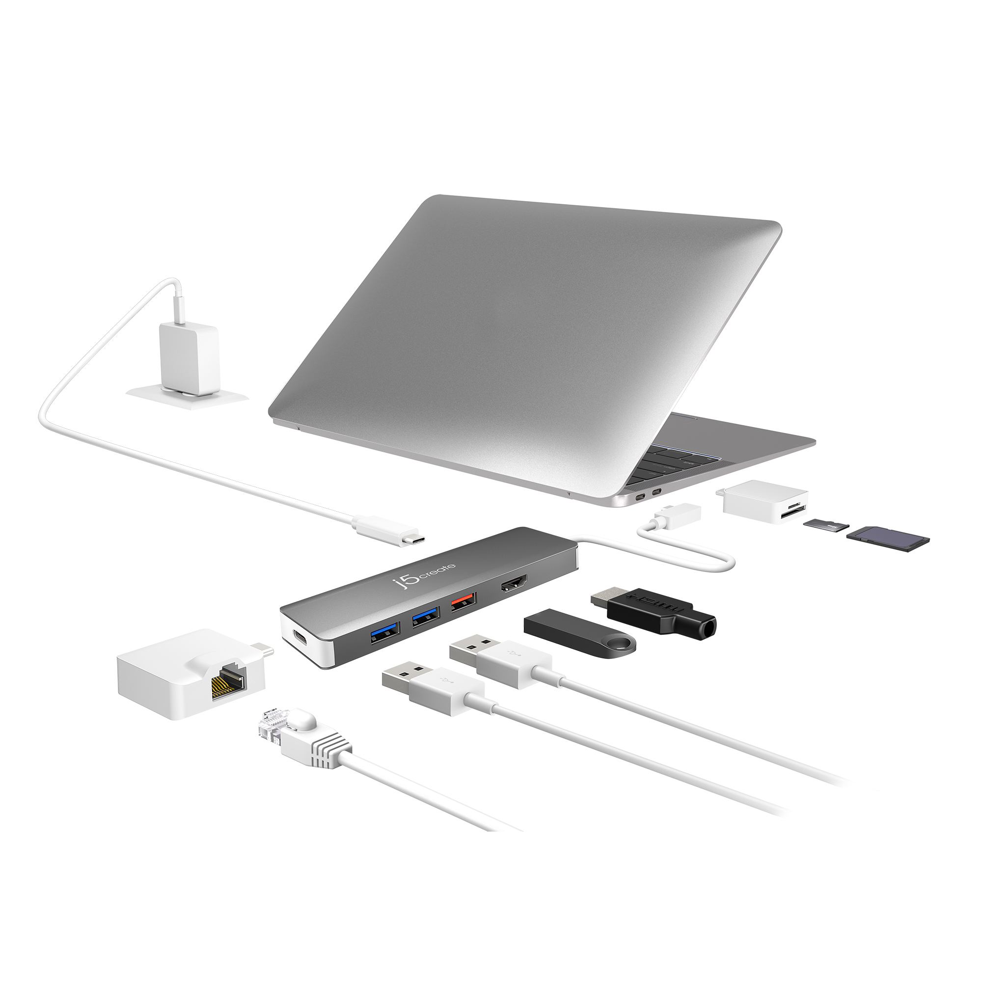 Ein Laptop, der über einen Hub mit verschiedenen Geräten verbunden ist.