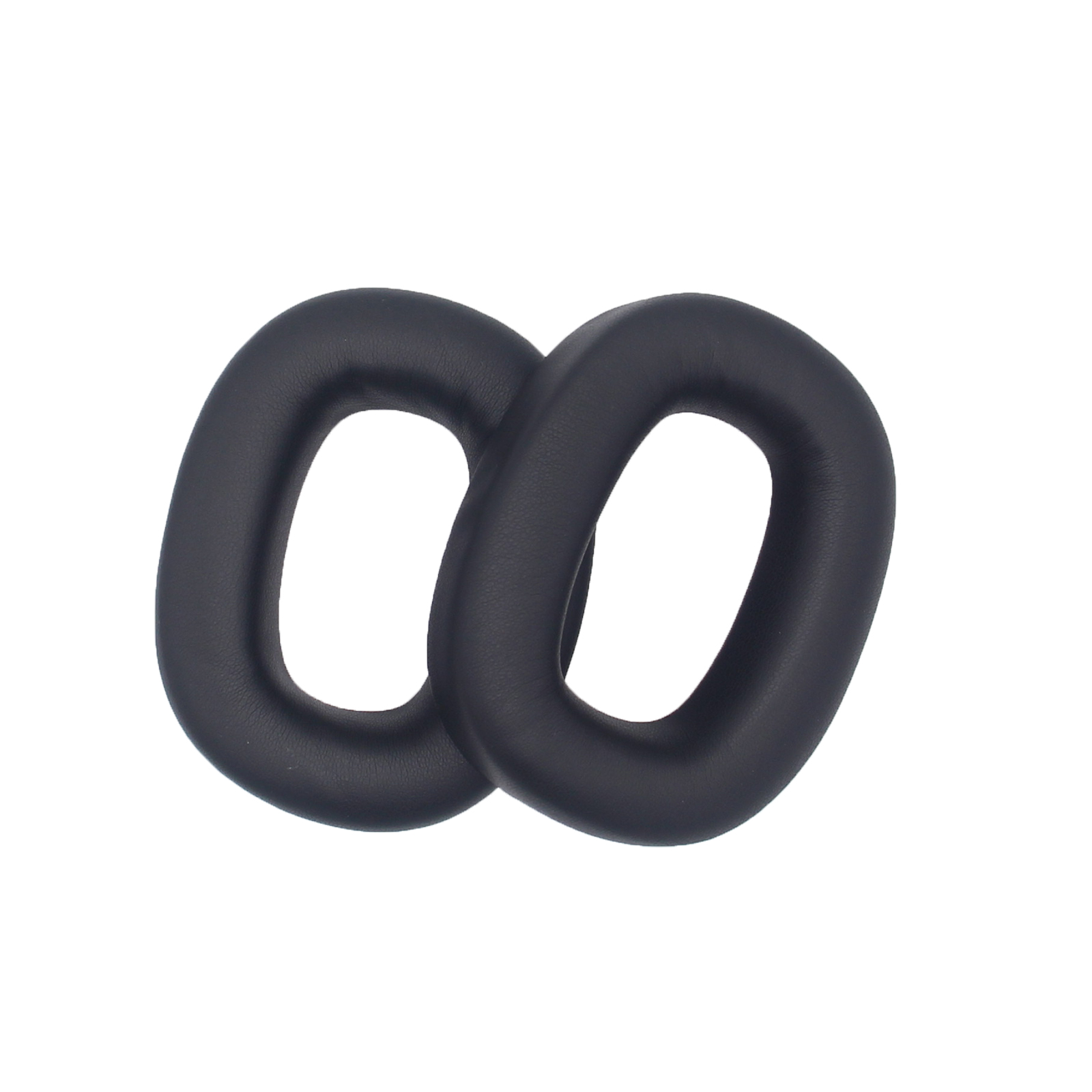 Dwie czarne poduszki na uszy. Poduszki mają owalny kształt z otworem pośrodku.