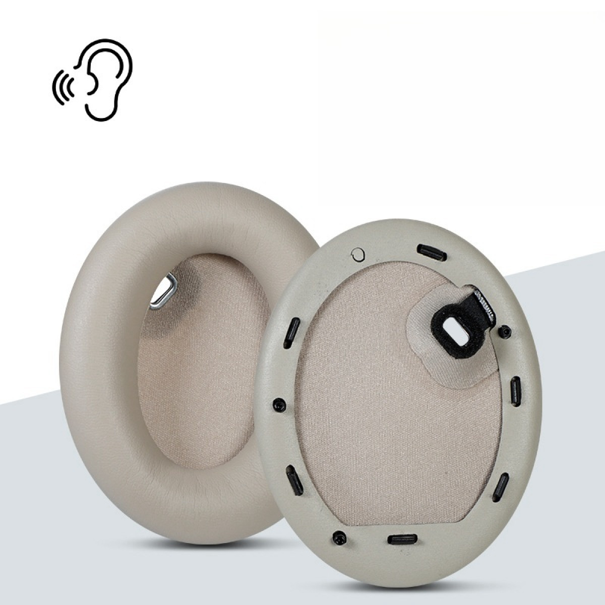 Dwie beżowe wkładki do słuchawek, pokazujące przód i tył. Ikona słuchu znajduje się w lewym górnym rogu.