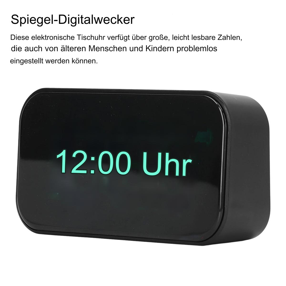 Ein schwarzer, spiegelartiger Digitalwecker mit grünen Zahlen, der 12:00 Uhr anzeigt.