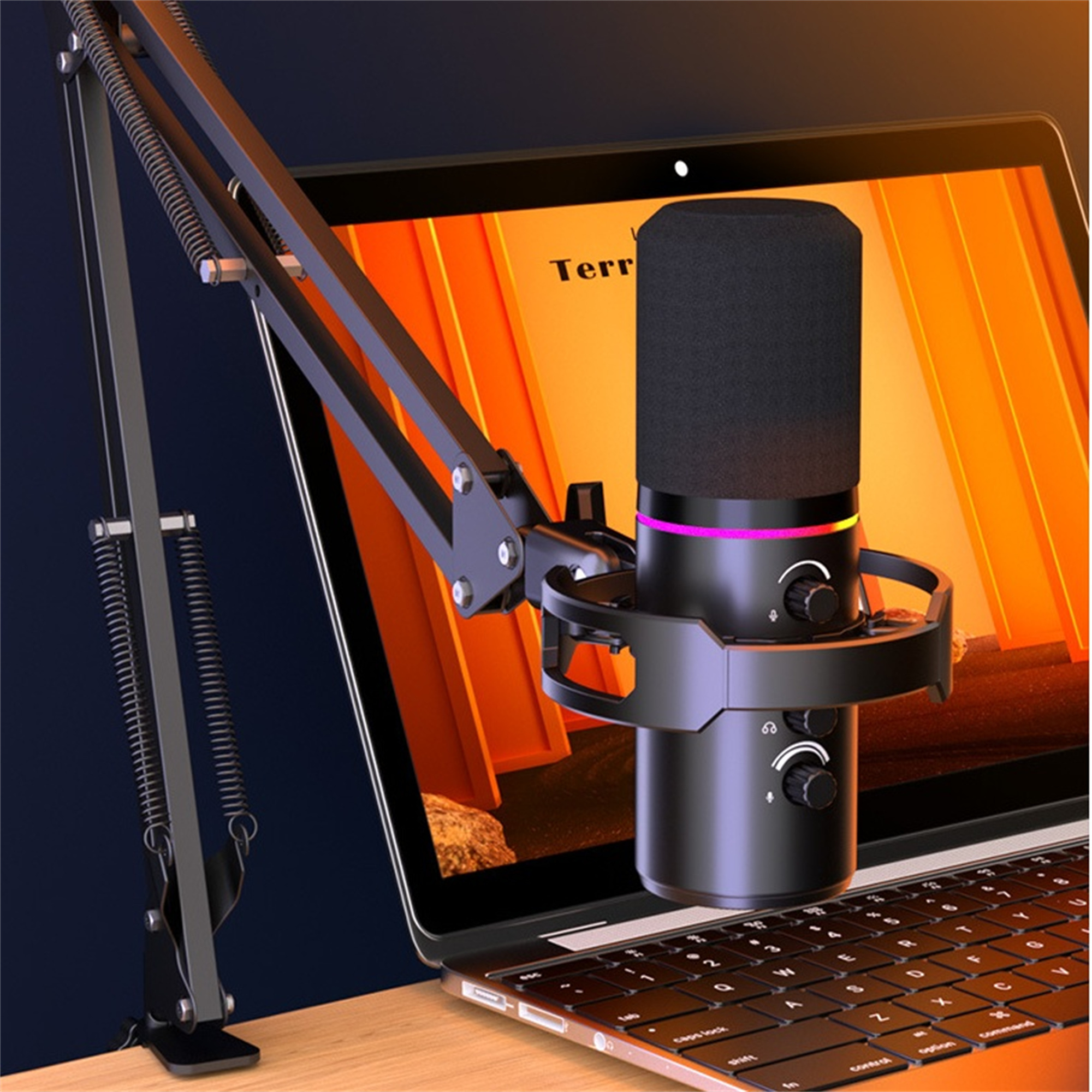 Schwarzes Mikrofon auf einem Laptop. Mikrofon hat Pop-Filter, Lautstärkeregler, an einem Arm.
