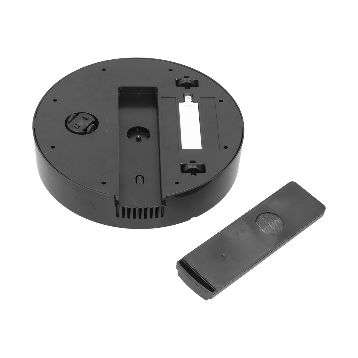Schwarze Basis mit abnehmbarer Fernbedienung. Die Basis hat eine Öffnung für eine Batterie.