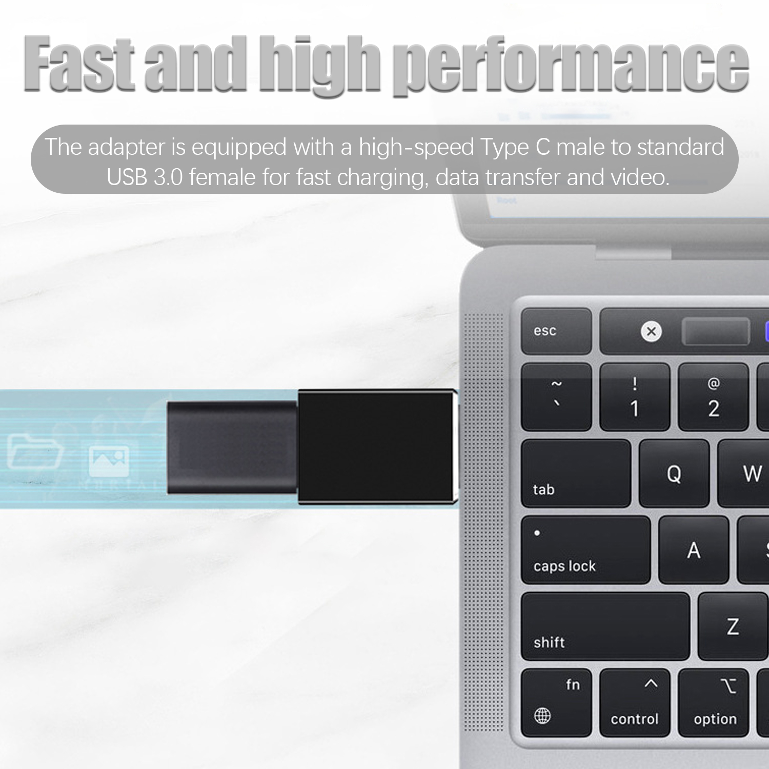 Ein schwarzer USB-C-Adapter, der mit einer Laptop-Tastatur verbunden ist, mit Text.