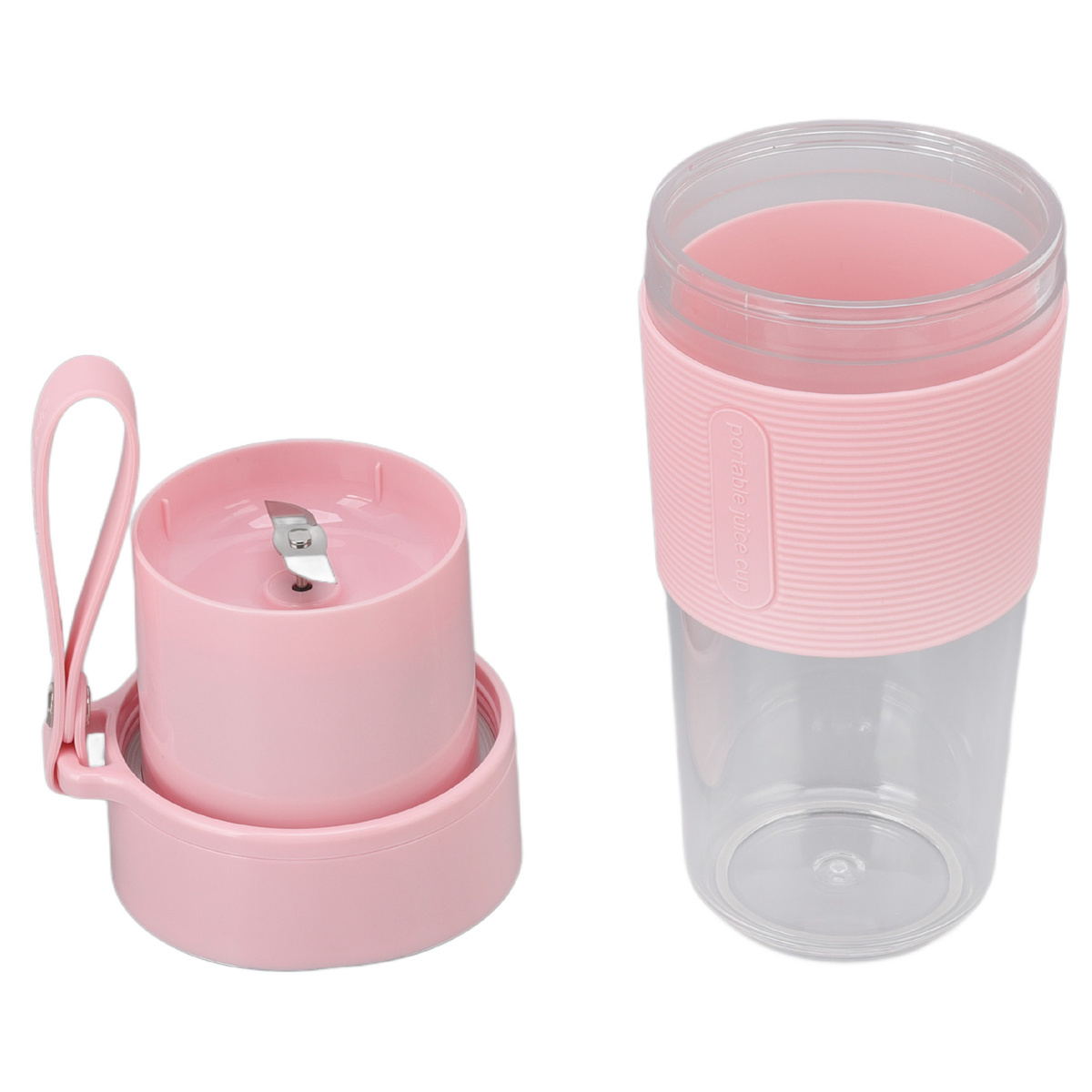 Ein zerlegter rosa Mixer mit Becher, Klingenteil und Basis.