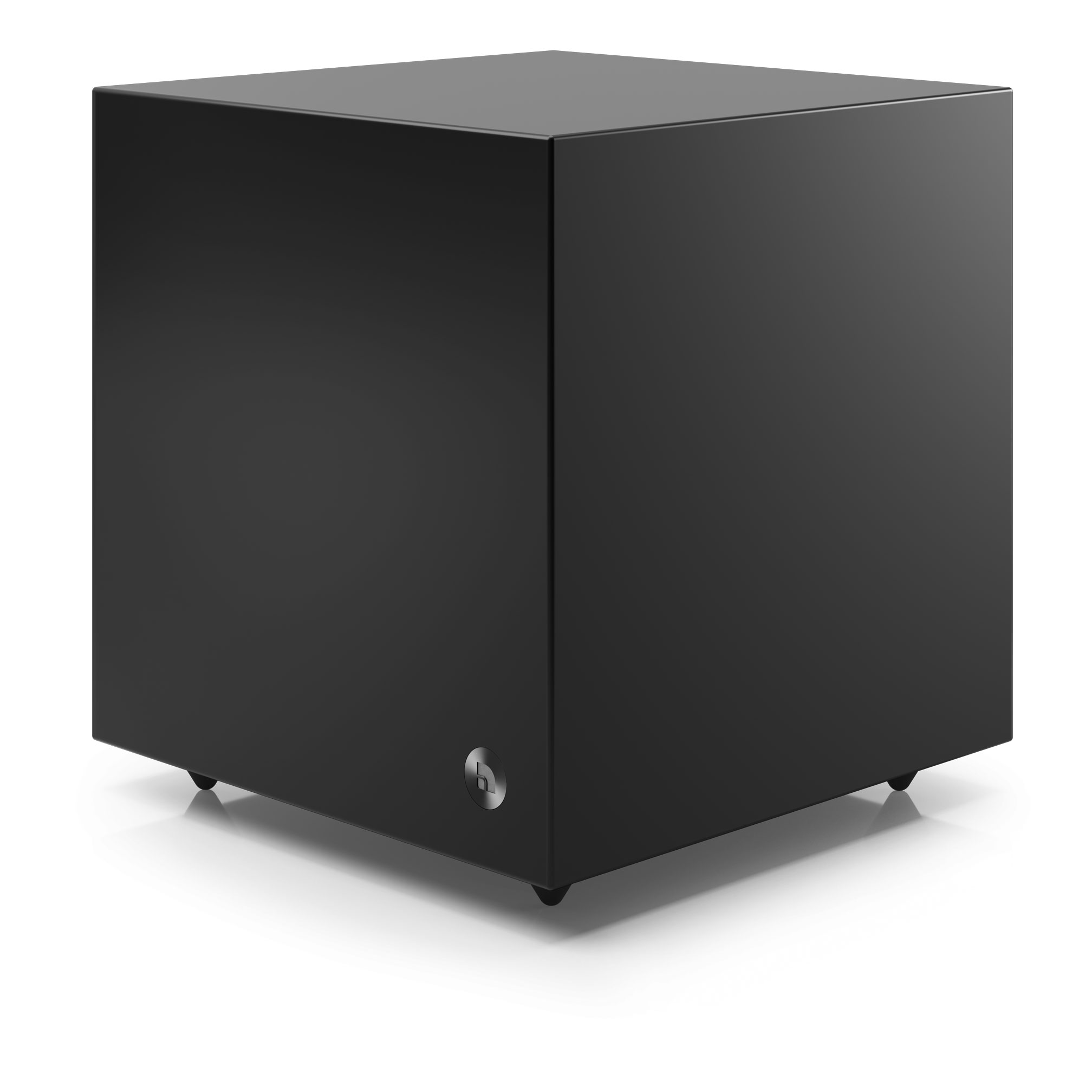 Black, cube-shaped subwoofer with rounded corners, on a white surface.