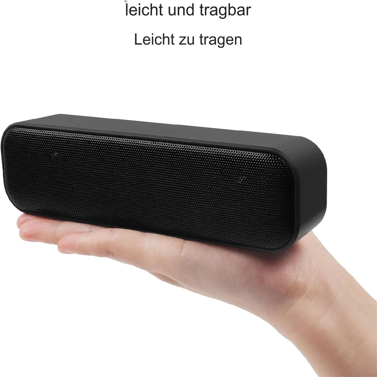 Ein schwarzer rechteckiger Lautsprecher, der von einer Person gehalten wird. Es hat ein Lautsprechergitter.