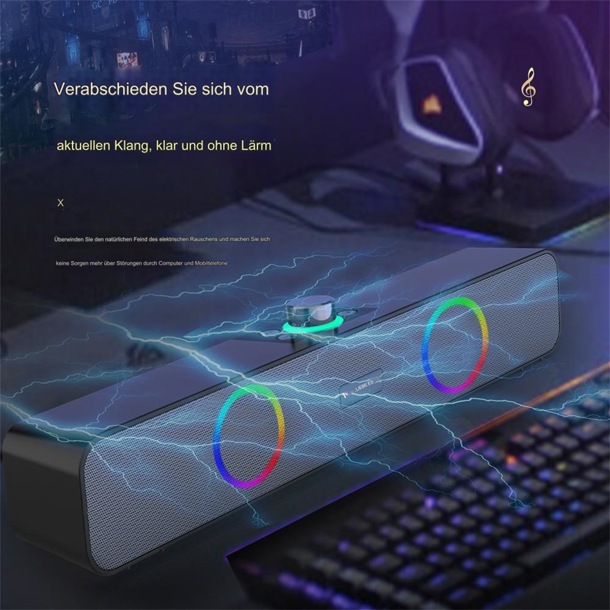 Schwarzer Lautsprecher mit RGB-Lichtern und einem Lautstärkeregler. Eine Tastatur ist im Hintergrund.