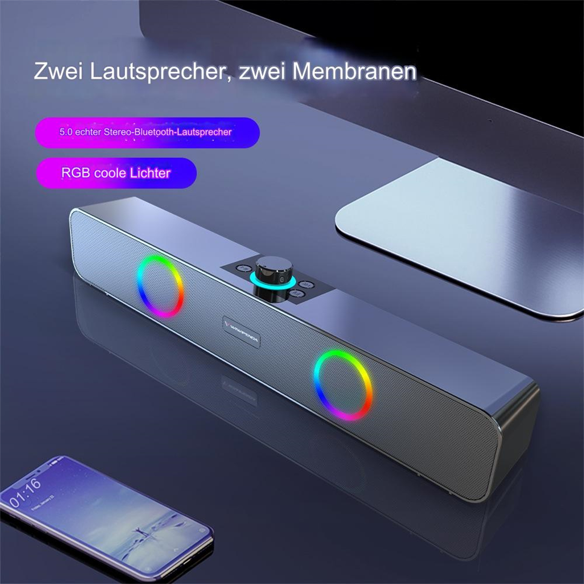 Ein grauer Lautsprecher mit bunten Lichtern und einem Telefon.