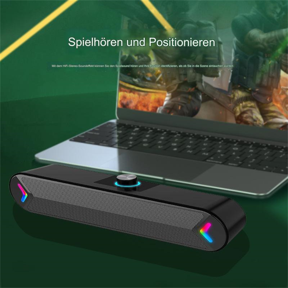 Schwarzer Lautsprecher mit einem Lautstärkeregler und einem Laptop. Der Lautsprecher hat bunte Lichter an den Enden.