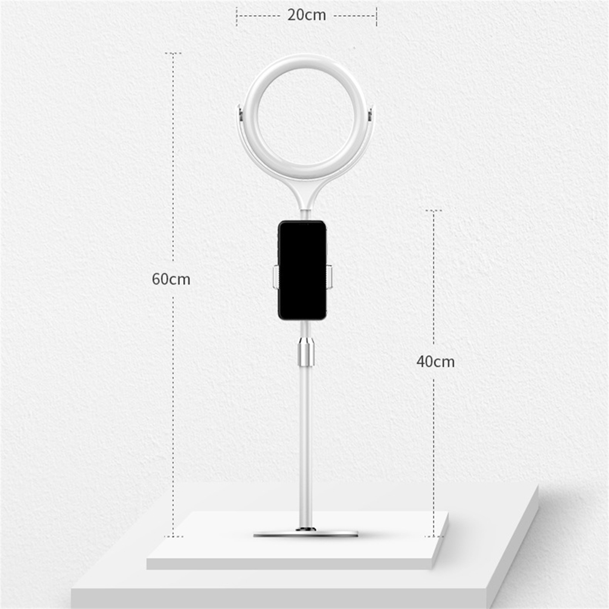 Ein weißes Ringlicht mit Telefonhalter und Ständer, Abmessungen in cm angegeben.
