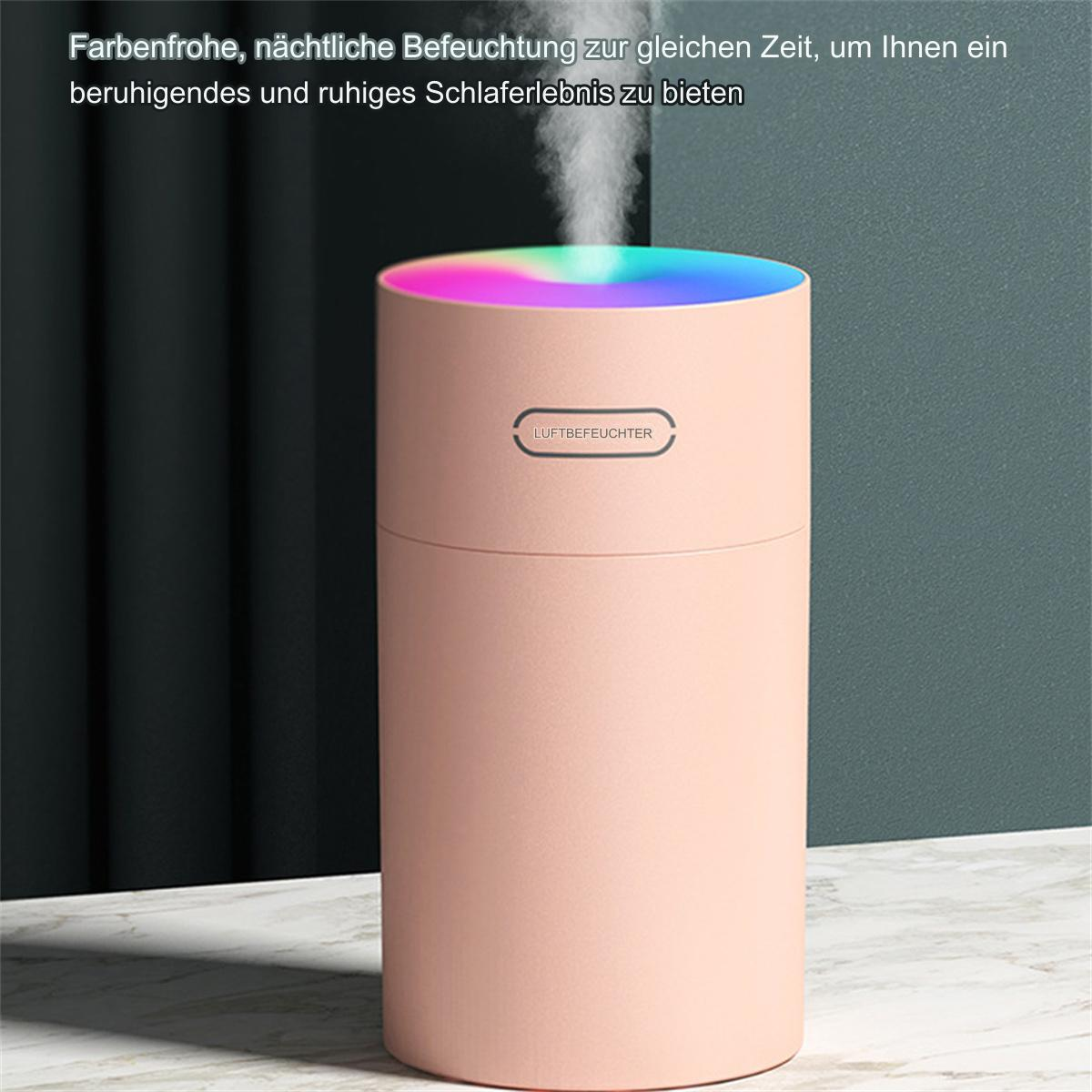 Pinkfarbener Luftbefeuchter mit Farbwechsel-Licht, Dampf kommt heraus.