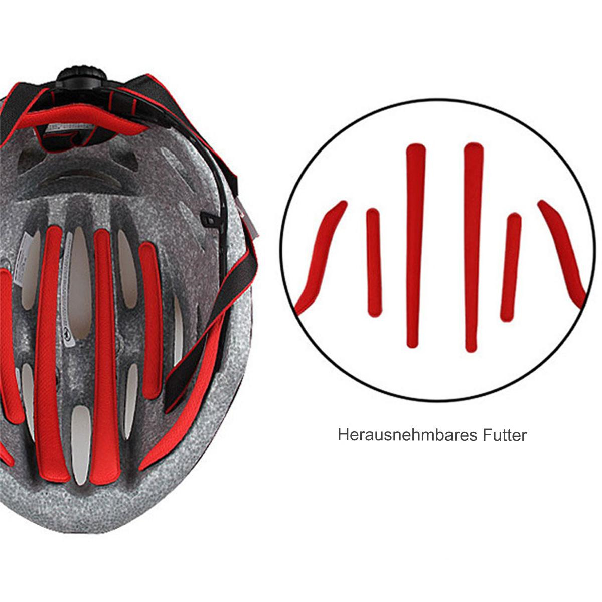 Fahrradhelm, grau, mit roter Polsterung innen. Ein kreisförmiges Detail zeigt Polsterung.