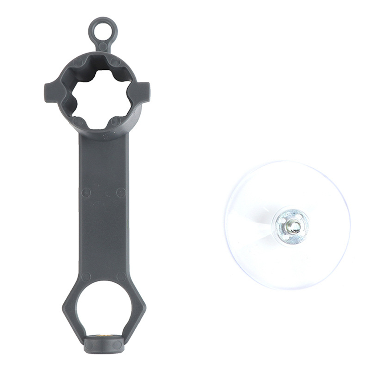 Graues Multitool und Saugnapf. Das Werkzeug ist grau, mit unterschiedlich geformten Löchern. Der Becher ist klar.