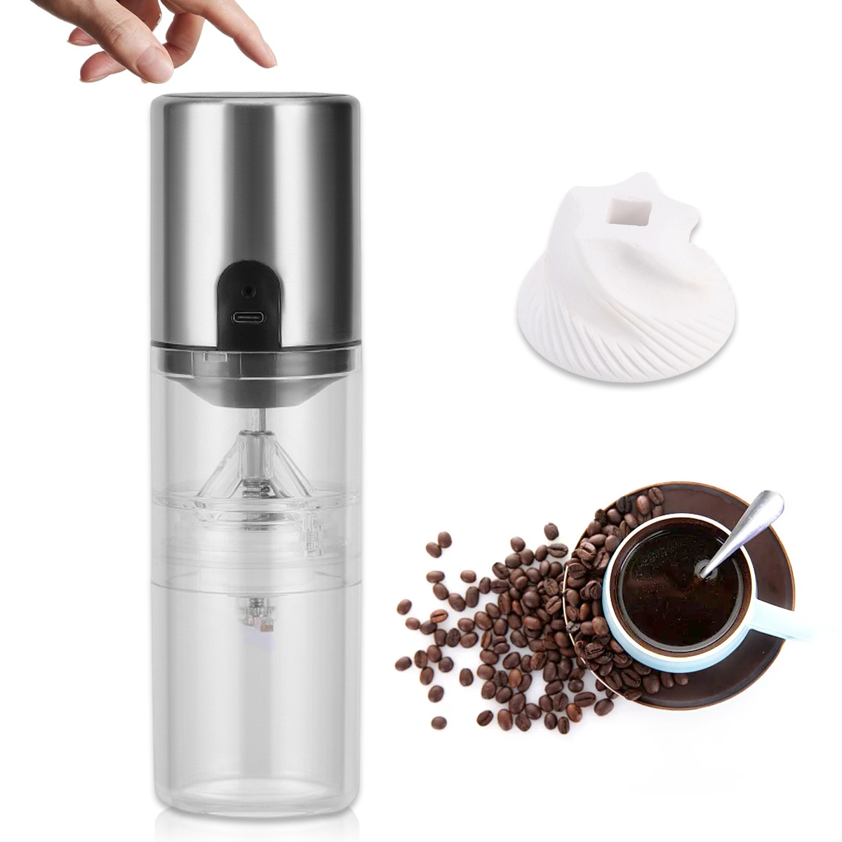 Kaffeemühle, Kaffeebohnen, Kaffeetasse und eine Hand, die die Mühle berührt.