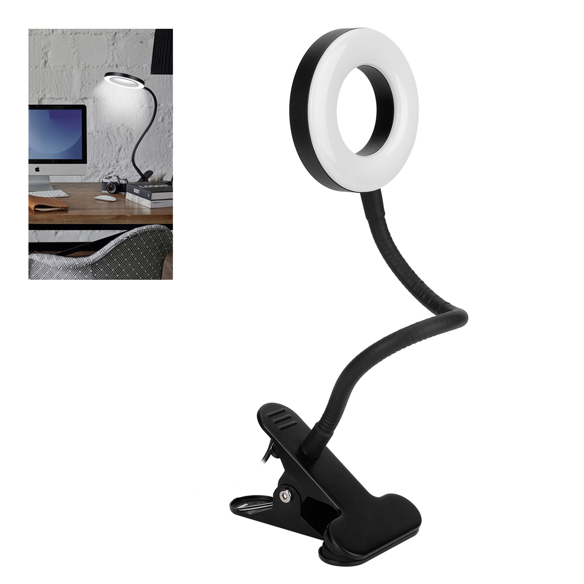 Ein schwarzes Ringlicht mit flexiblem Arm und Clip, auf einem Schreibtisch mit Computer.