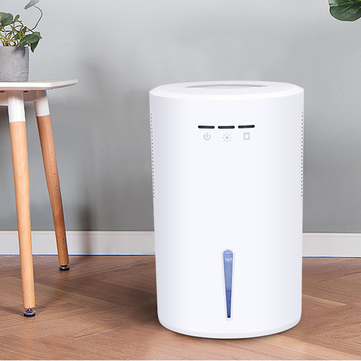 Biały oczyszczacz powietrza z przyciskami sterowania i niebieskim wskaźnikiem poziomu wody.