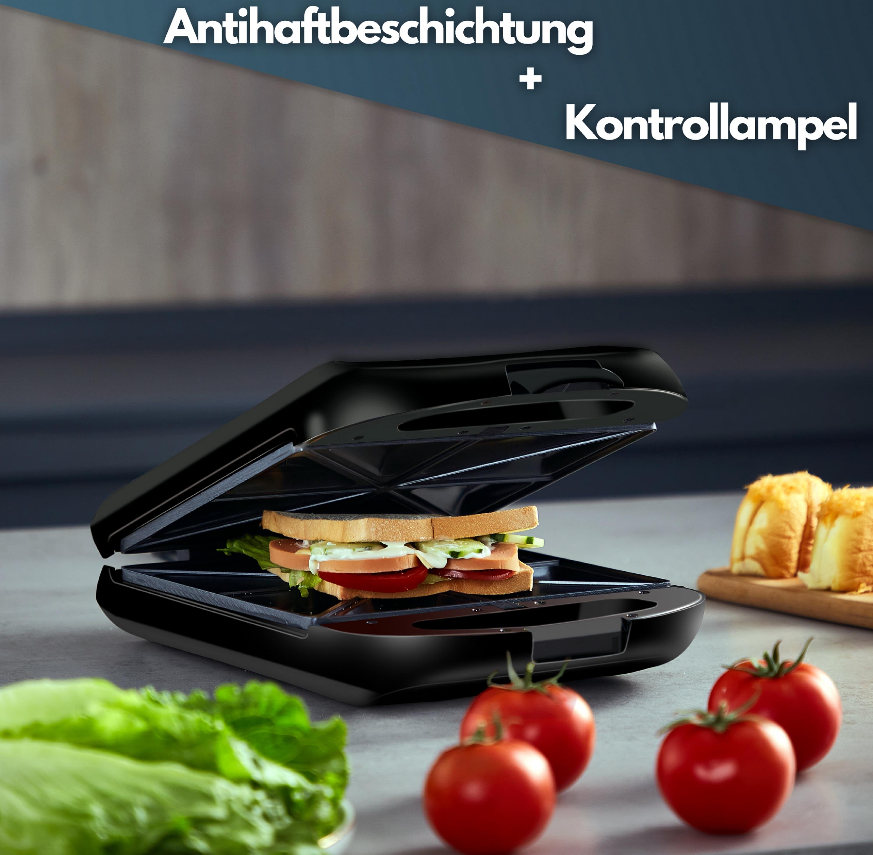 Schwarzer Sandwichmaker mit Sandwich und Tomaten.