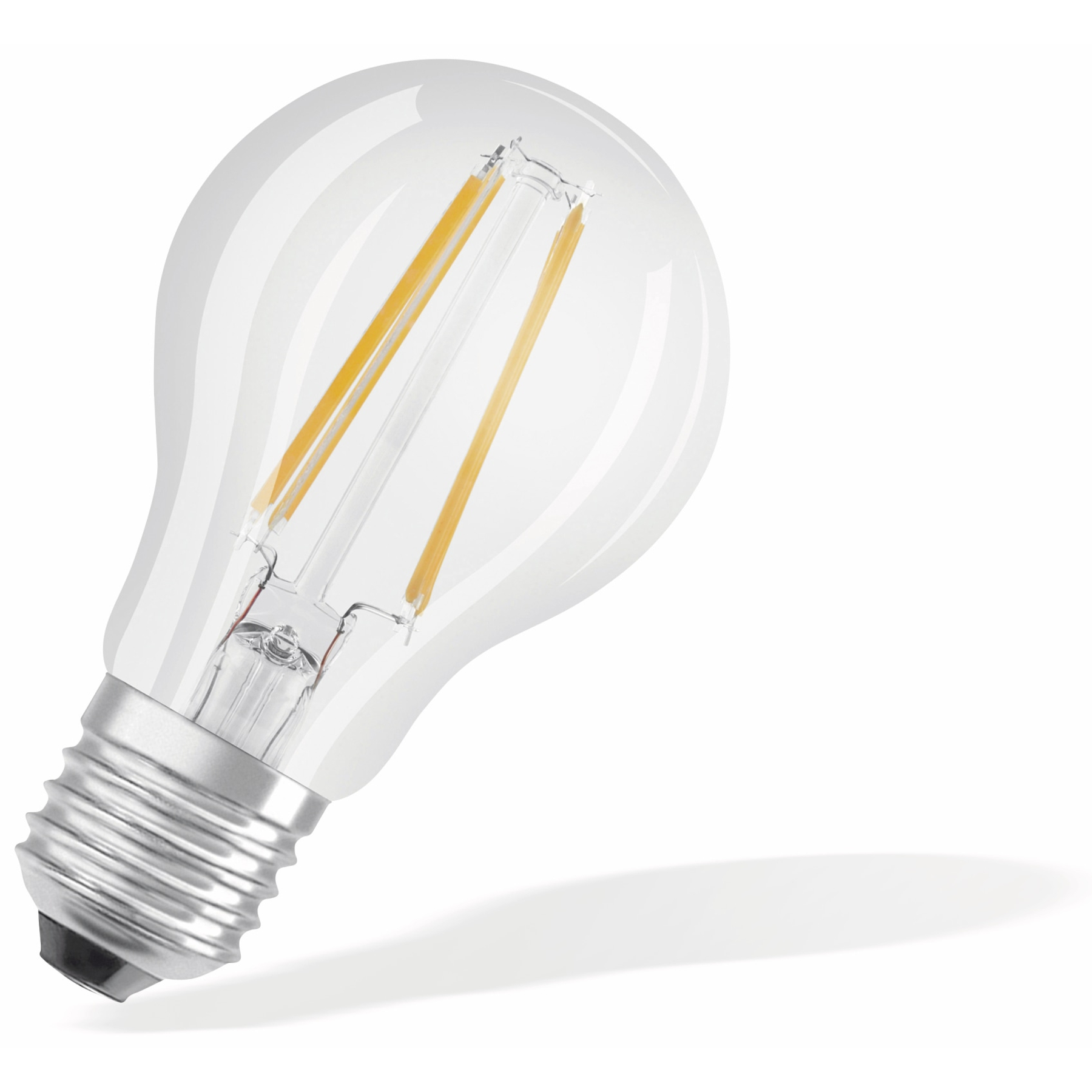 Ampoule transparente avec filaments jaunes. Base argentée. Ombragée sur fond blanc.