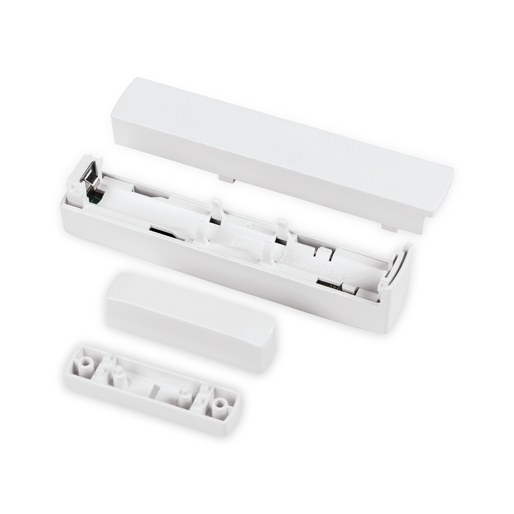 Białe komponenty, zdemontowane, prawdopodobnie do czujnika drzwi, na białym tle.