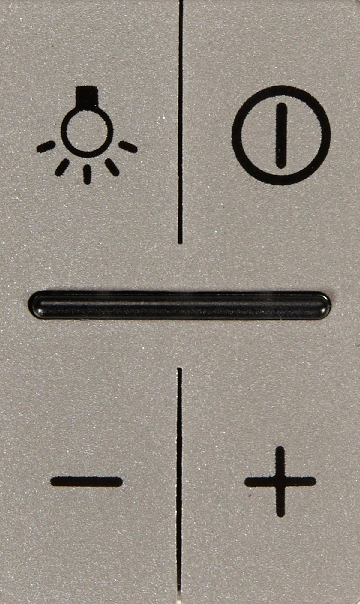 Graues Bedienfeld mit Licht-, Strom- und Plus/Minus-Symbolen, durch Linien geteilt.