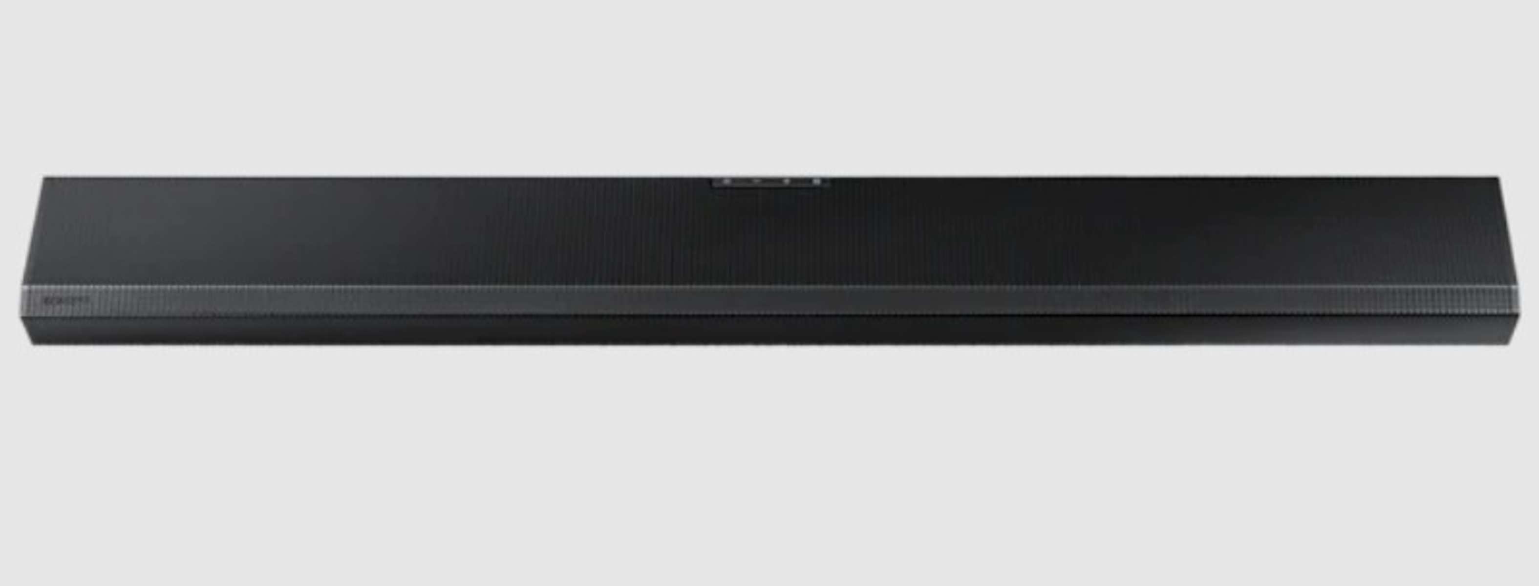 Długi, czarny soundbar na jasnoszarym tle. Elegancki i nowoczesny design.