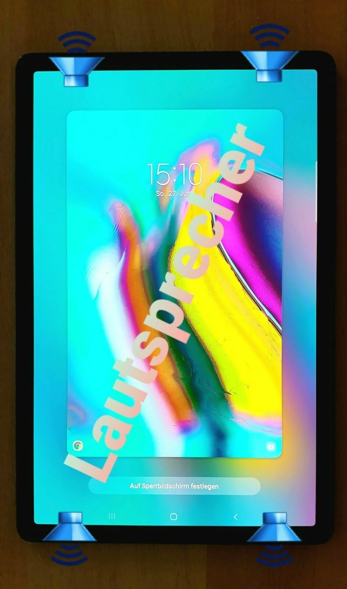 Ein schwarzes Tablet mit hellem Bildschirm, das ein farbenfrohes Bild und Text zeigt.