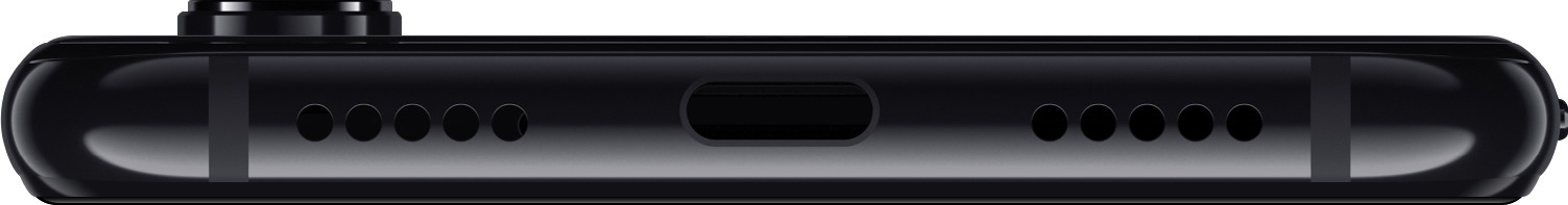 Primo piano della parte inferiore di un telefono nero con altoparlanti, porta USB-C e fori per il microfono.