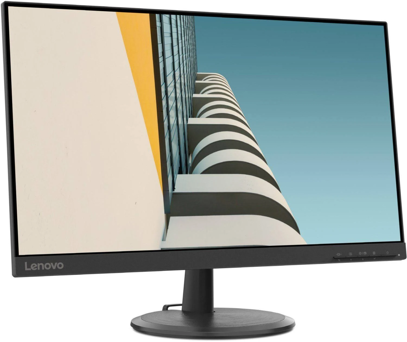 Monitor komputera wyświetla nowoczesny budynek na tle nieba. Logo marki Lenovo znajduje się na monitorze.