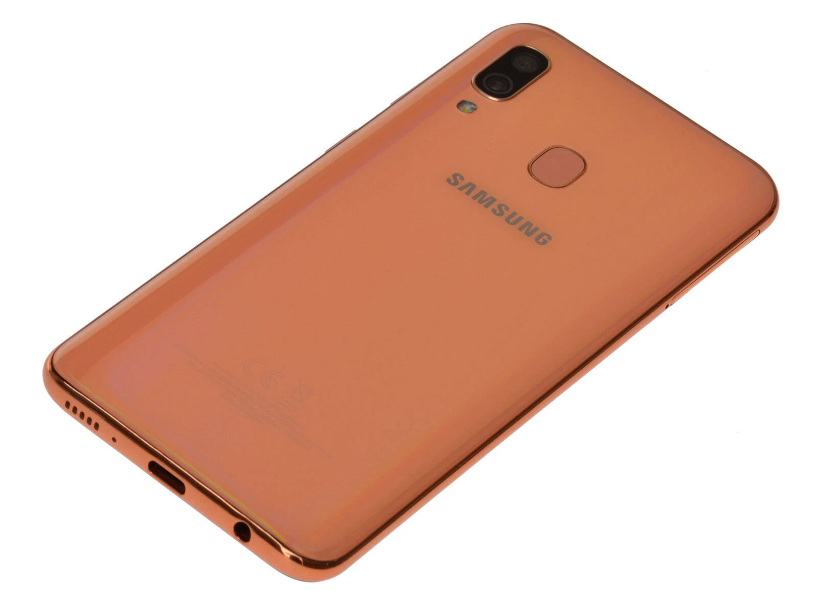 Rückseite eines orangefarbenen Smartphones mit Kamera, Samsung-Logo und Fingerabdrucksensor.