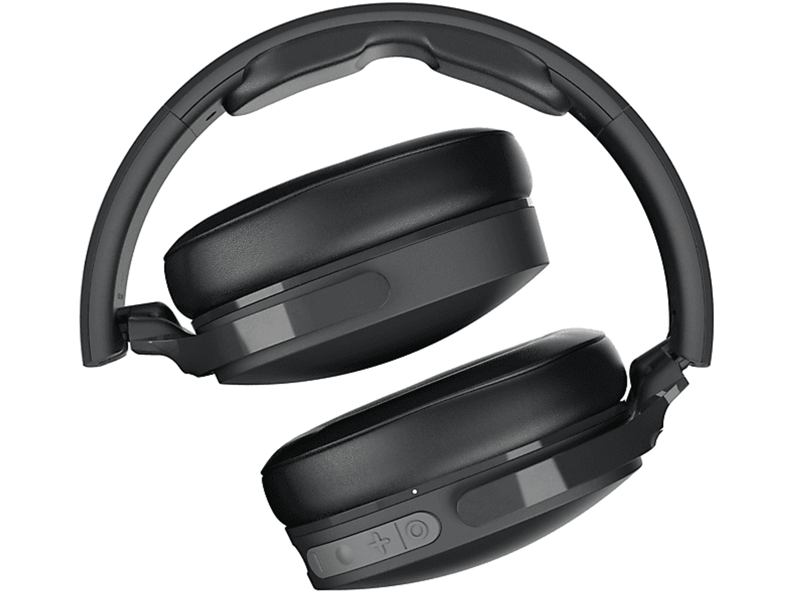 Czarny, złożony zestaw słuchawkowy. Ma czarne nauszniki i czarną opaskę. Widoczne są elementy sterujące.