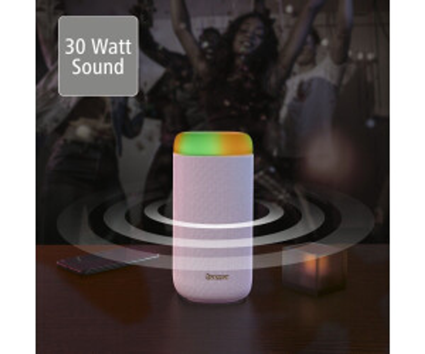 Cylindryczny głośnik z różowym korpusem i zielono-żółtą górą. Wychodzą z niego fale dźwiękowe.