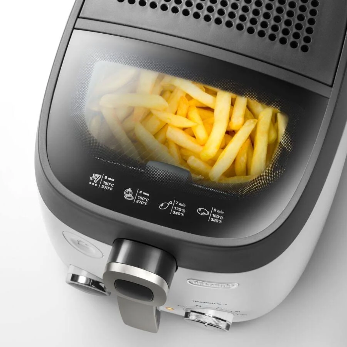 Frytownica z frytkami w środku. Frytownica jest biało-czarna z przezroczystą pokrywą.