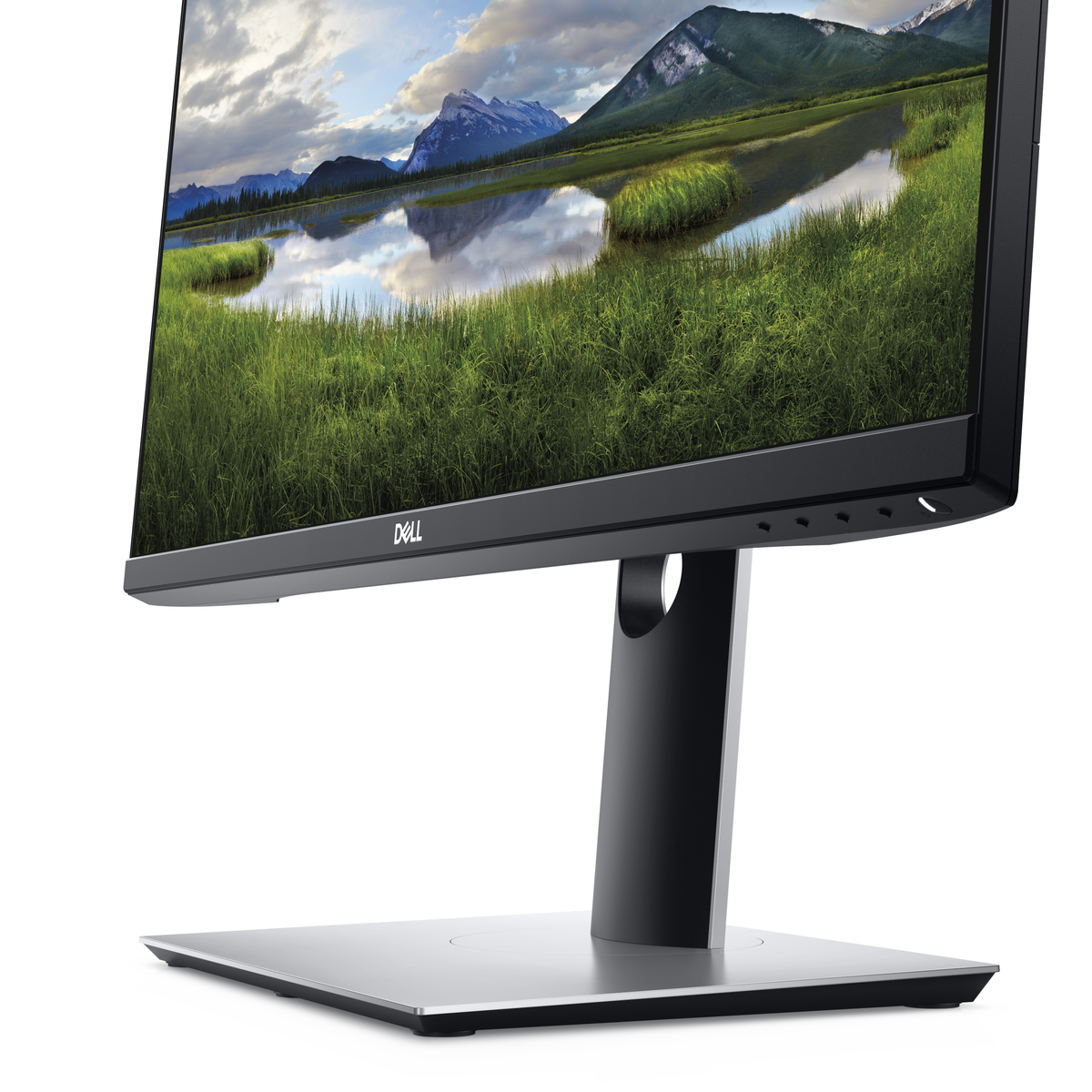 Un monitor Dell con supporto, che mostra un paesaggio di montagne e acqua.
