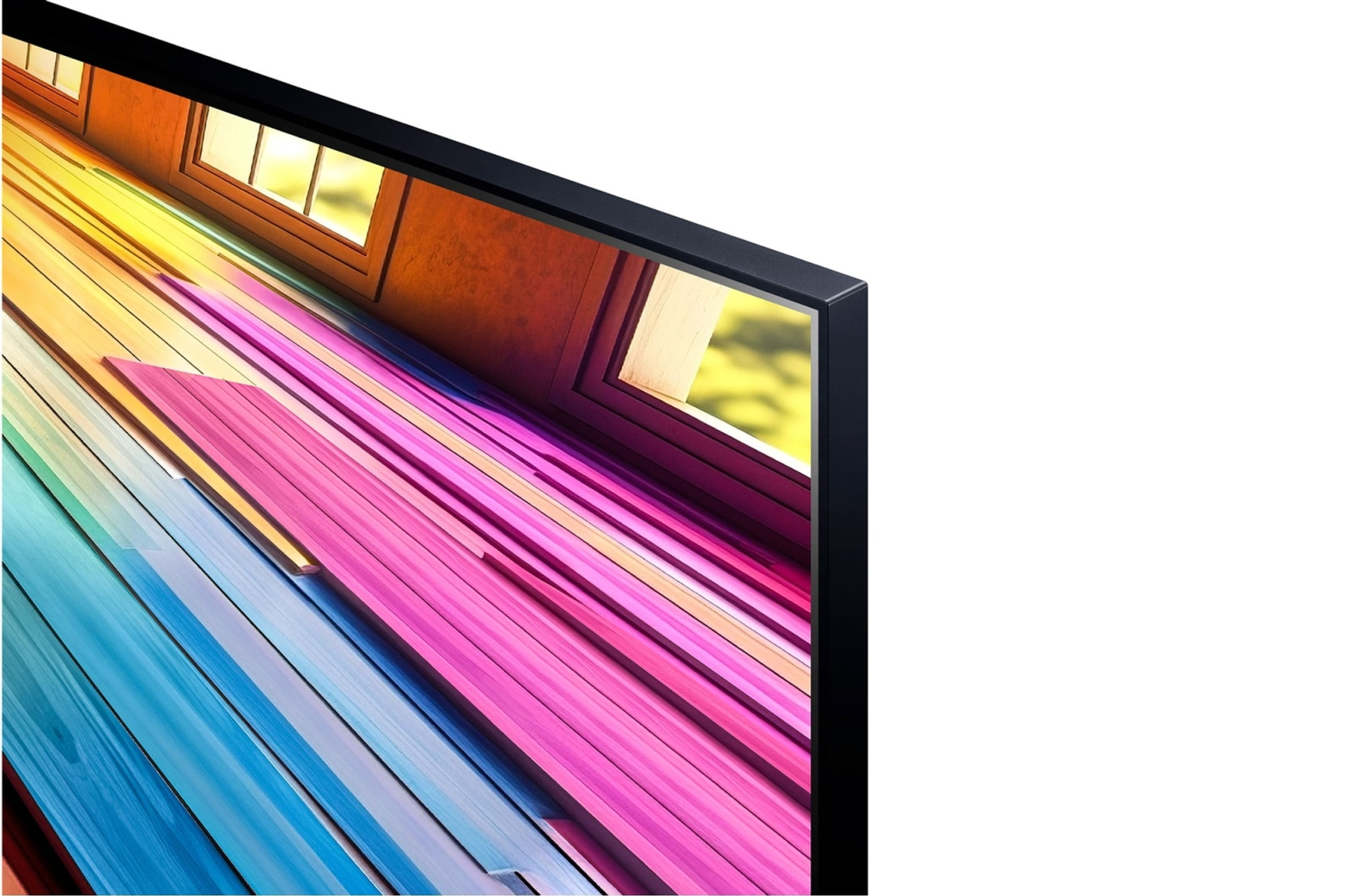 Close-up van een tv-schermhoek, een kleurrijk abstract beeld vult het scherm.